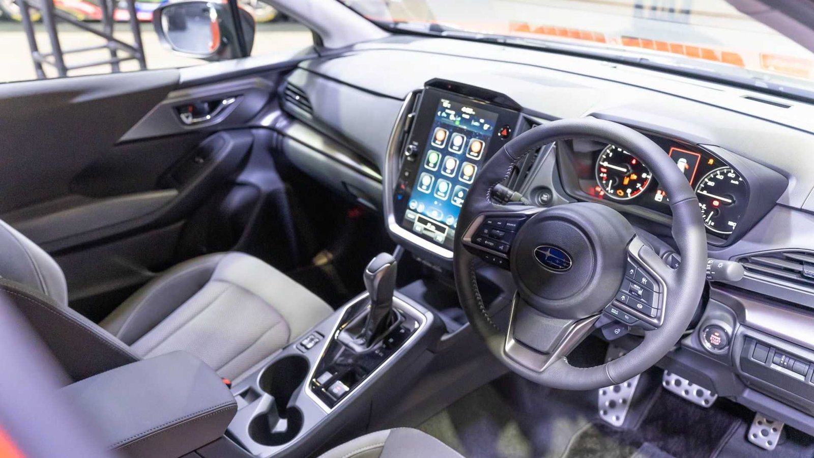 2024 Subaru Impreza with STI details shown in Tokyo Autos Rodando USA